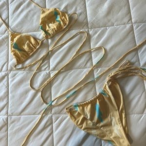 Emrata’s brand. Size small. Cream w other print accents.